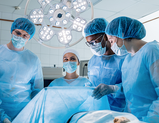 Surgeons performing gynecologic surgery in an operating room