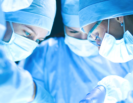 Surgeons performing an operation in a sterile environment
