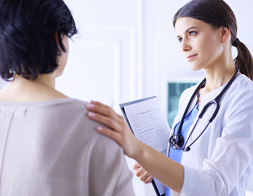 Doctor comforting a patient
