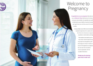Pregnant woman talking to female doctor at clinic